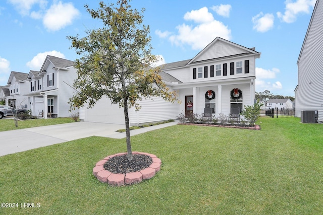 view of property featuring cooling unit, a front lawn, and covered porch