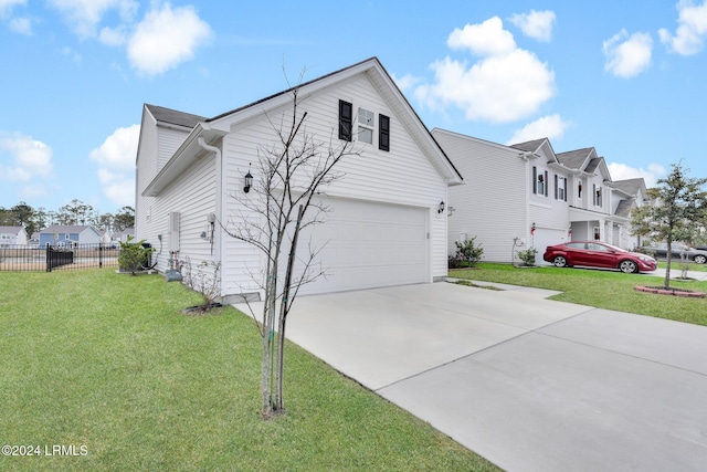 view of property exterior with a garage and a lawn