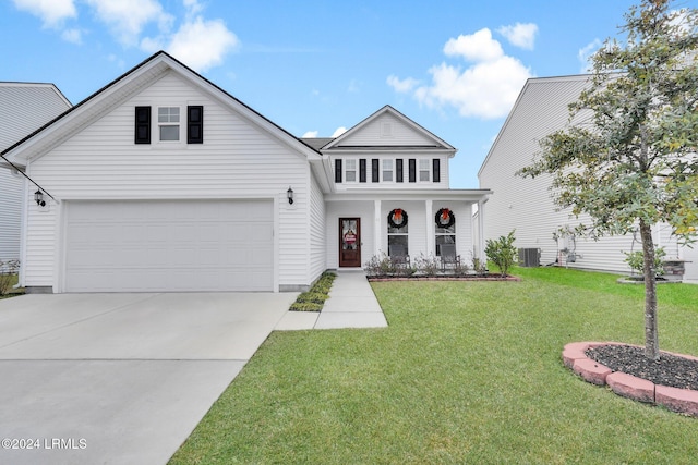 view of front of house with a porch, a garage, central AC unit, and a front lawn