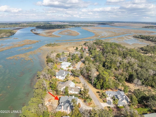 aerial view with a residential view and a water view