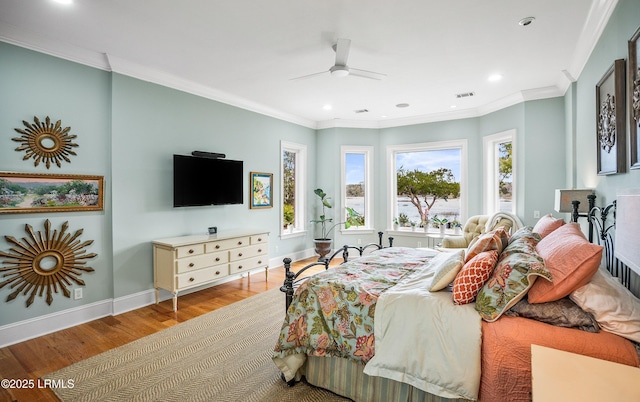 bedroom featuring ornamental molding, recessed lighting, baseboards, and wood finished floors