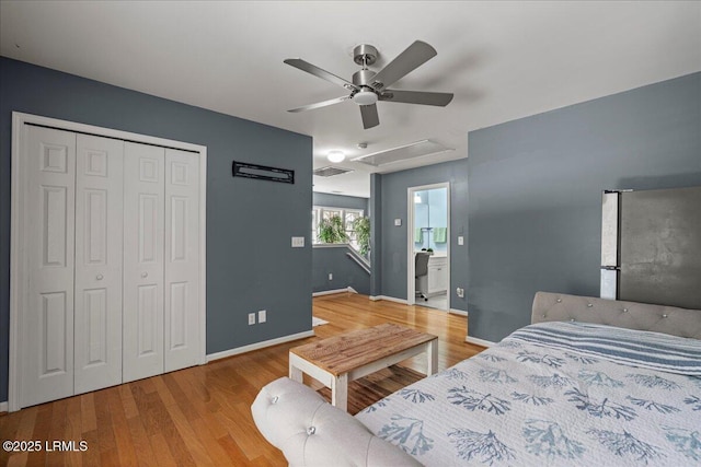 56 Timbercrest Cir, Hilton Head Island, SC 29926 - bedroom featuring attic access, a closet, ceiling fan, freestanding refrigerator, and wood finished floors