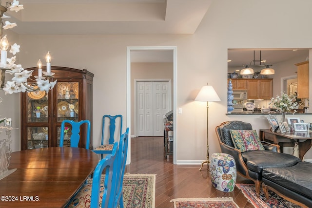 dining space featuring dark hardwood / wood-style flooring