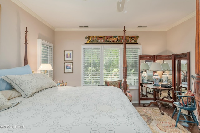 bedroom featuring ornamental molding and ceiling fan