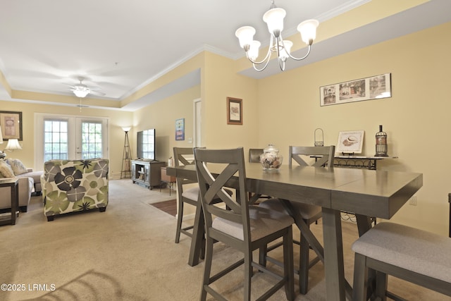4924 Bluffton Pkwy Unit 18-202, Bluffton, SC 29910 - dining area featuring a chandelier, crown molding, light carpet, a tray ceiling, and ceiling fan