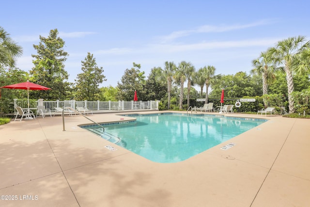 4924 Bluffton Pkwy Unit 18-202, Bluffton, SC 29910 - community pool featuring a patio and view of scattered trees