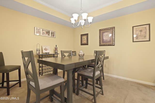 4924 Bluffton Pkwy Unit 18-202, Bluffton, SC 29910 - dining room featuring a chandelier, ornamental molding, baseboards, and carpet flooring