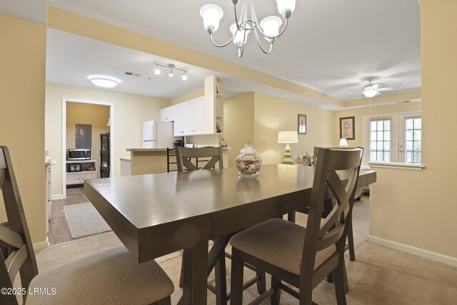 4924 Bluffton Pkwy Unit 18-202, Bluffton, SC 29910 - dining area with baseboards, a chandelier, light carpet, and ceiling fan