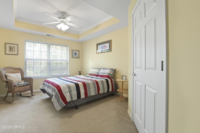 4924 Bluffton Pkwy Unit 18-202, Bluffton, SC 29910 - bedroom featuring carpet floors, a raised ceiling, baseboards, ornamental molding, and a ceiling fan