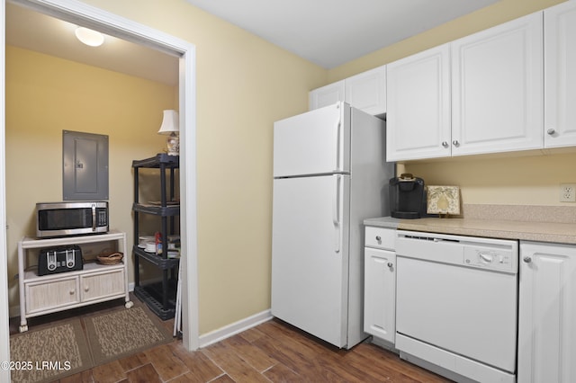 4924 Bluffton Pkwy Unit 18-202, Bluffton, SC 29910 - kitchen with white appliances, electric panel, dark wood finished floors, white cabinets, and light countertops