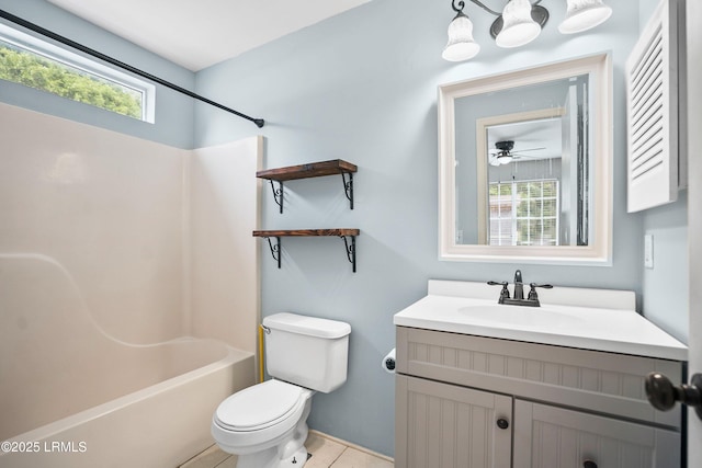 2718 Waddell Rd, Beaufort, SC 29902 - full bathroom with vanity, shower / bathtub combination, toilet, tile patterned floors, and a ceiling fan