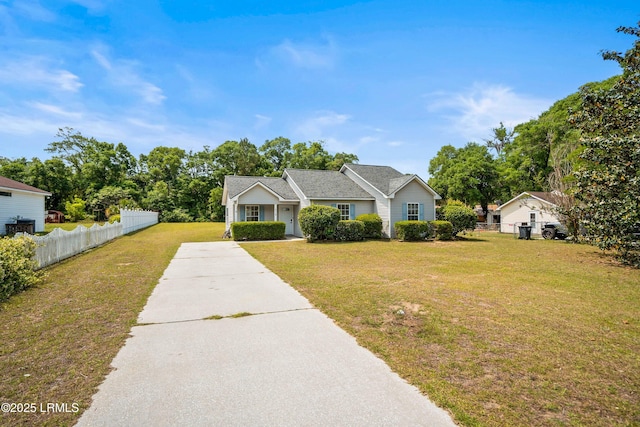 2718 Waddell Rd, Beaufort, SC 29902 - ranch-style house with fence, driveway, and a front yard