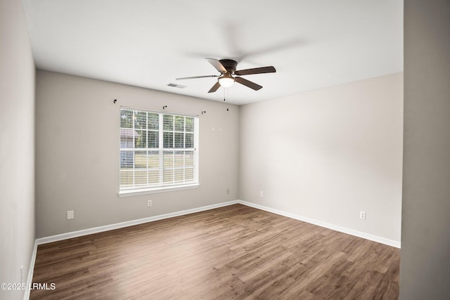 2718 Waddell Rd, Beaufort, SC 29902 - spare room with baseboards, ceiling fan, and wood finished floors