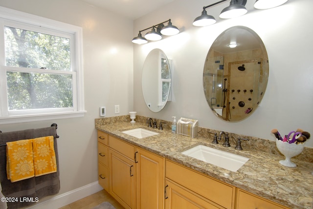 bathroom featuring vanity and walk in shower