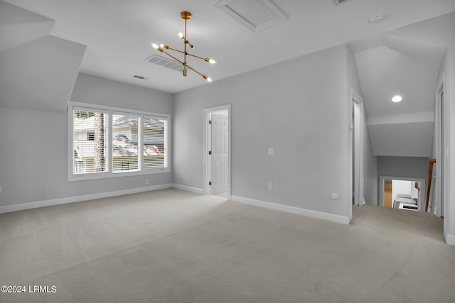 interior space featuring light colored carpet, lofted ceiling, and a notable chandelier