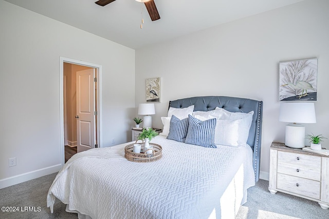 bedroom with ceiling fan and carpet flooring