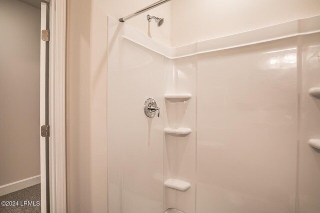 bathroom featuring a shower