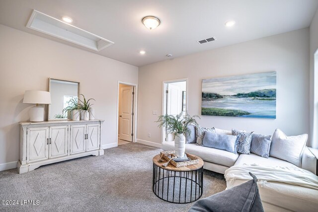 living room featuring light colored carpet