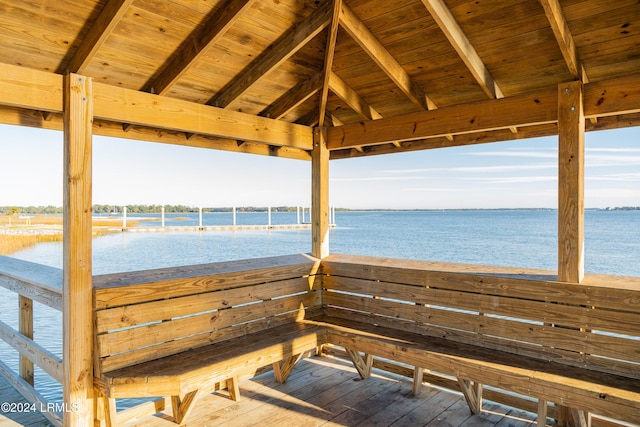 exterior space with a water view and a gazebo