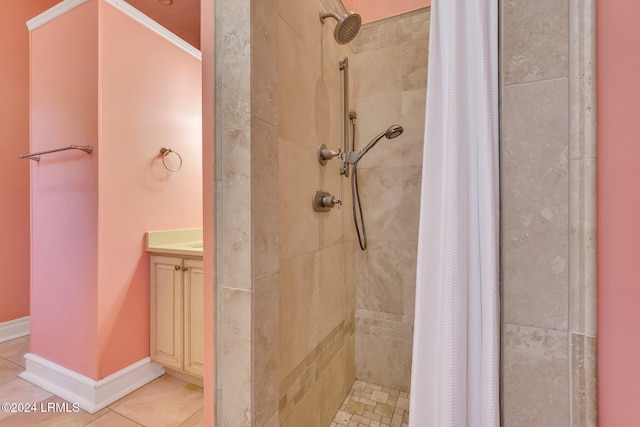 bathroom with tile patterned floors and curtained shower