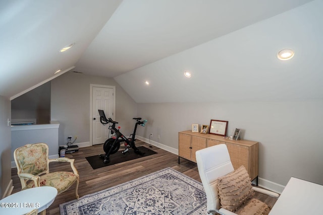 exercise area with lofted ceiling, baseboards, wood finished floors, and recessed lighting