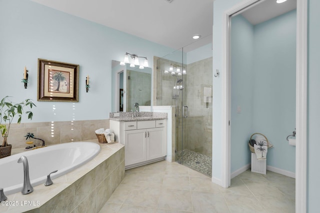 bathroom featuring vanity, shower with separate bathtub, and tile patterned floors