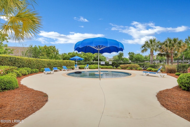 view of swimming pool featuring a patio