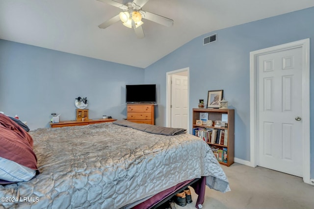 carpeted bedroom featuring vaulted ceiling and ceiling fan