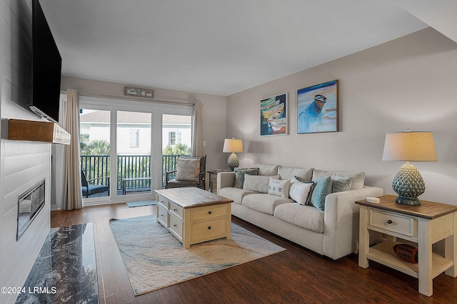 living room with dark hardwood / wood-style floors