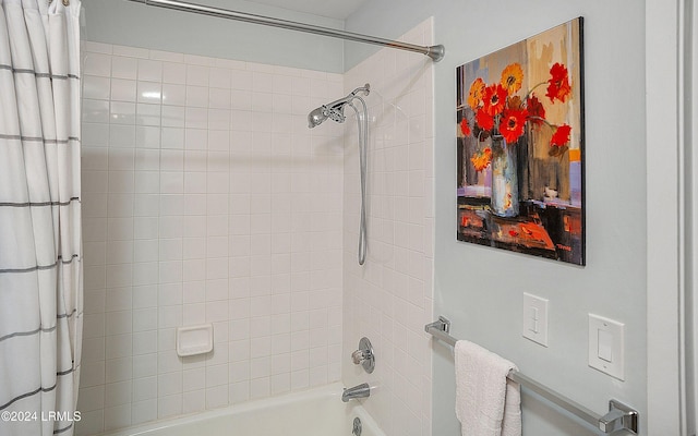 bathroom with shower / bathtub combination with curtain