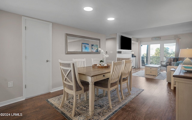 dining room featuring dark hardwood / wood-style flooring