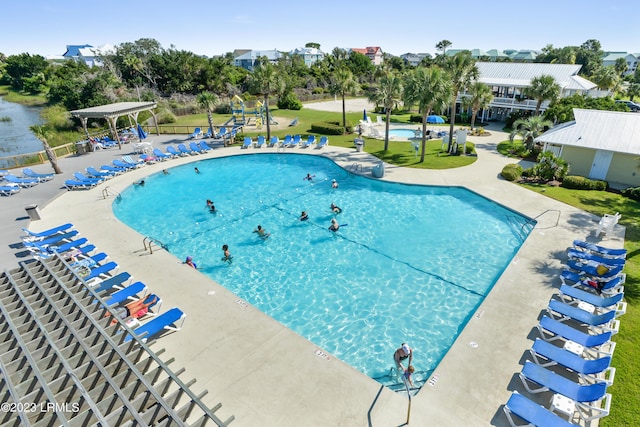 view of swimming pool with a patio and a gazebo