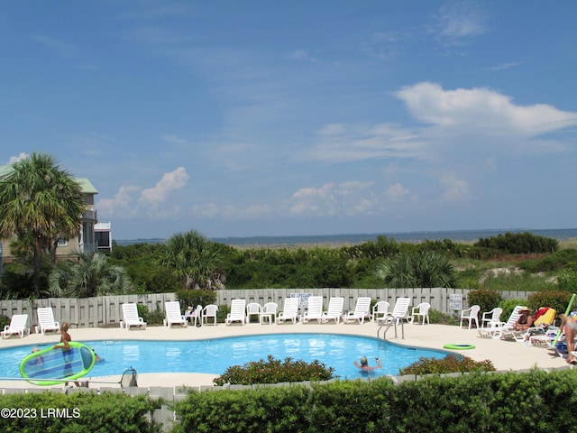 view of pool featuring a patio area