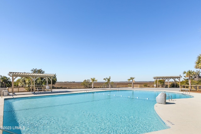 view of pool with a pergola