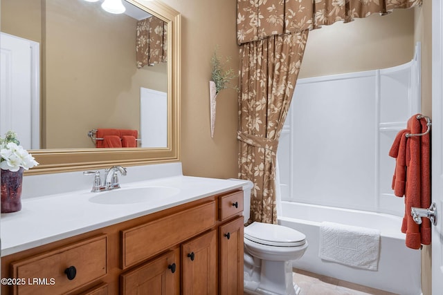 full bath featuring shower / tub combo with curtain, vanity, and toilet