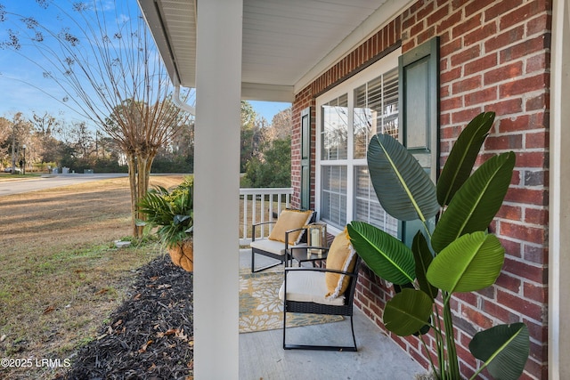 view of patio featuring a porch