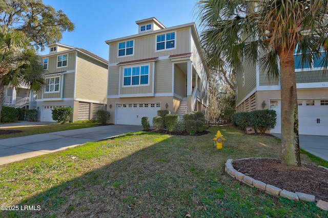 view of front of house featuring a garage and a front lawn