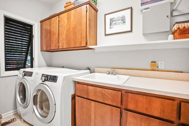207 Odingsell Ct, Saint Helena Island, SC 29920 - laundry room featuring cabinet space and washing machine and dryer