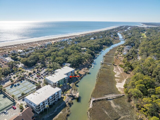 aerial view with a beach view and a water view