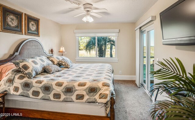 carpeted bedroom with a textured ceiling, access to outside, and ceiling fan