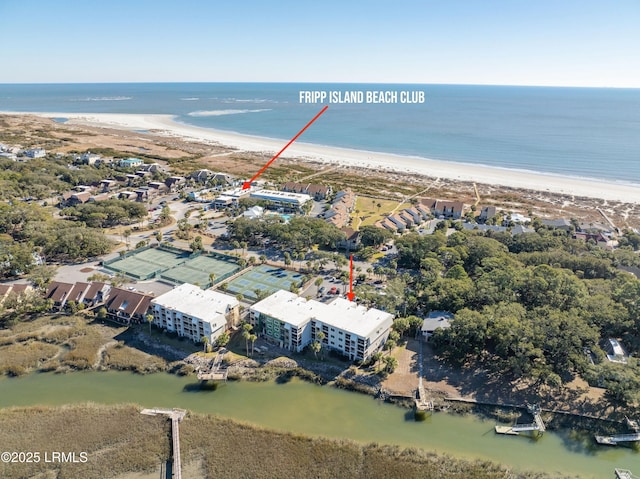 bird's eye view with a water view and a view of the beach