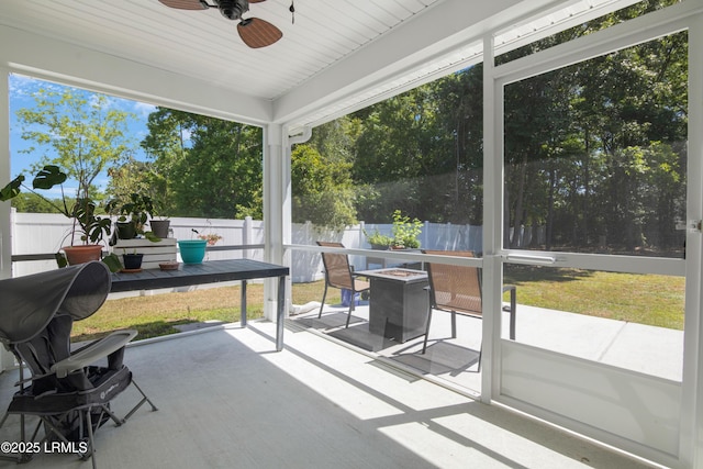 156 Teal Bluff Blvd, Seabrook, SC 29940 - sunroom featuring a fire pit, ceiling fan, and plenty of natural light