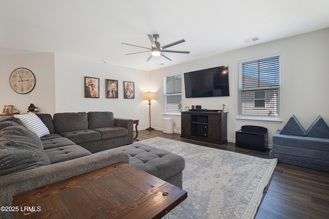 156 Teal Bluff Blvd, Seabrook, SC 29940 - living area featuring ceiling fan, healthy amount of natural light, dark wood-style flooring, and baseboards