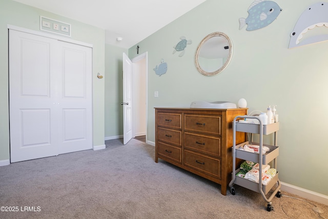 156 Teal Bluff Blvd, Seabrook, SC 29940 - bedroom featuring light carpet, baseboards, and a closet