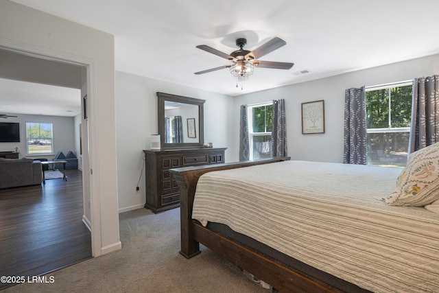 156 Teal Bluff Blvd, Seabrook, SC 29940 - bedroom featuring baseboards, a ceiling fan, and carpet flooring