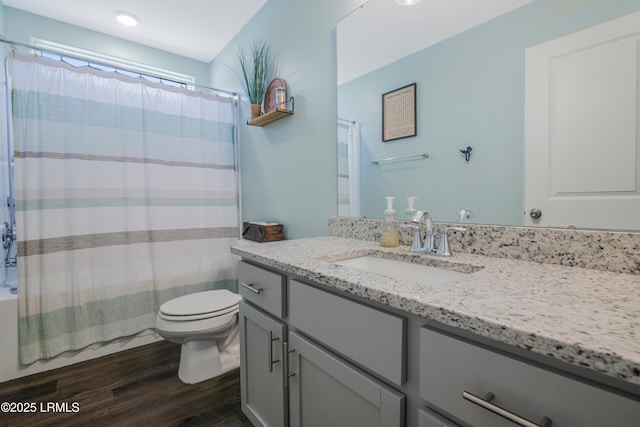 156 Teal Bluff Blvd, Seabrook, SC 29940 - full bathroom with wood finished floors, toilet, vanity, and shower / bathtub combination with curtain