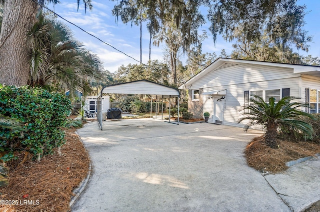 exterior space with a carport