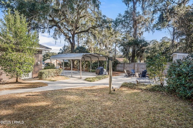 view of yard featuring a carport