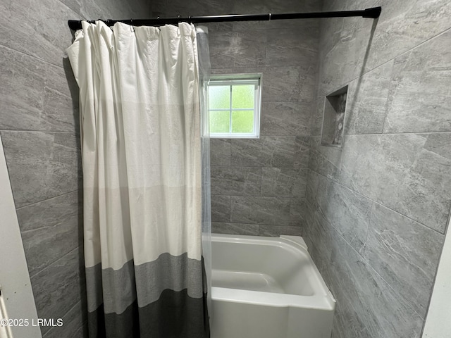 full bathroom featuring shower / bath combo with shower curtain