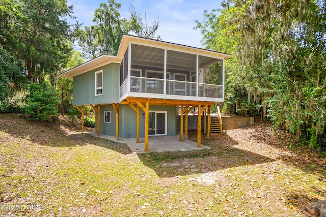 1203 Laudonniere St, Beaufort, SC 29902 - back of house with a sunroom, a patio, and stairs